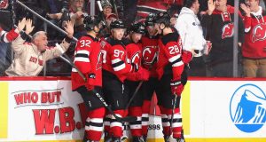 NEWARK, NEW JERSEY - FEBRUARY 20: Jesper Bratt #63 of the New Jersey Devils (C) celebrates his goal against Martin Jones #31 of the San Jose Sharks at 16:15 of the second period at the Prudential Center on February 20, 2020 in Newark, New Jersey.