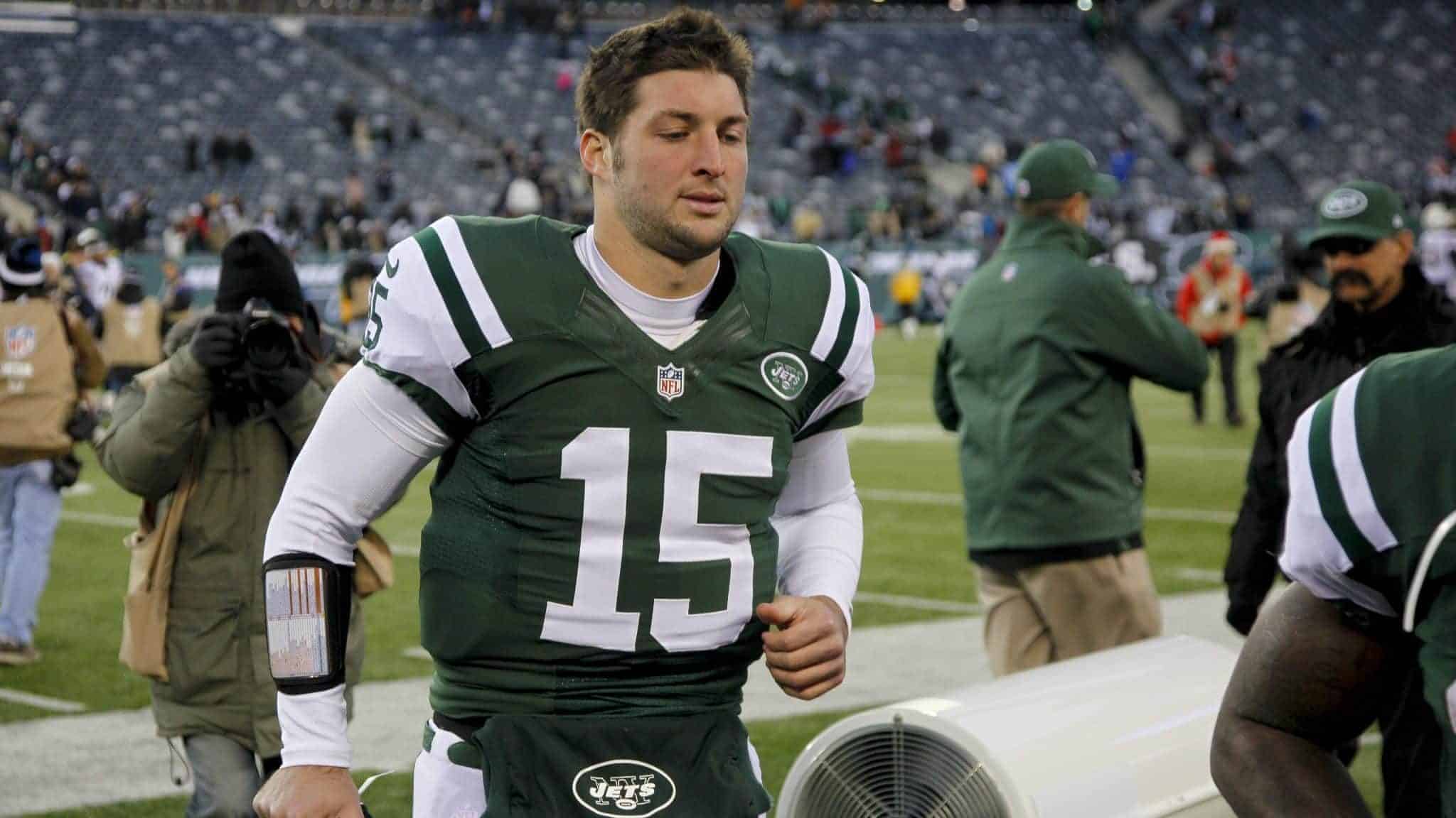 EAST RUTHERFORD, NJ - DECEMBER 23: Tim Tebow #15 of the New York Jets leaves the field after loss to San Diego Chargers at MetLife Stadium on December 23, 2012 in East Rutherford, New Jersey.