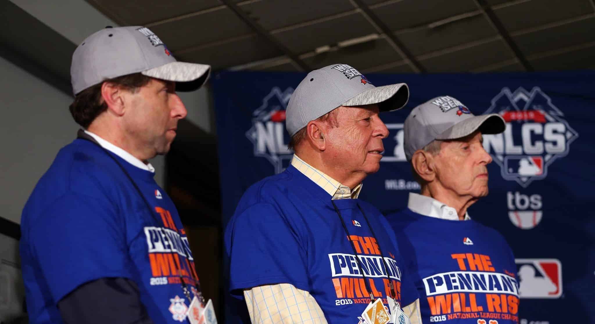 CHICAGO, IL - OCTOBER 21: (L-R) Chief Operating Officer Jeff Wilpon, Chief Executive Officer Saul Katz and Owner Fred Wilpon of the New York Mets look on after defeating the Chicago Cubs in game four of the 2015 MLB National League Championship Series at Wrigley Field on October 21, 2015 in Chicago, Illinois. The Mets defeated the Cubs with a score of 8 to 3 to sweep the Championship Series.