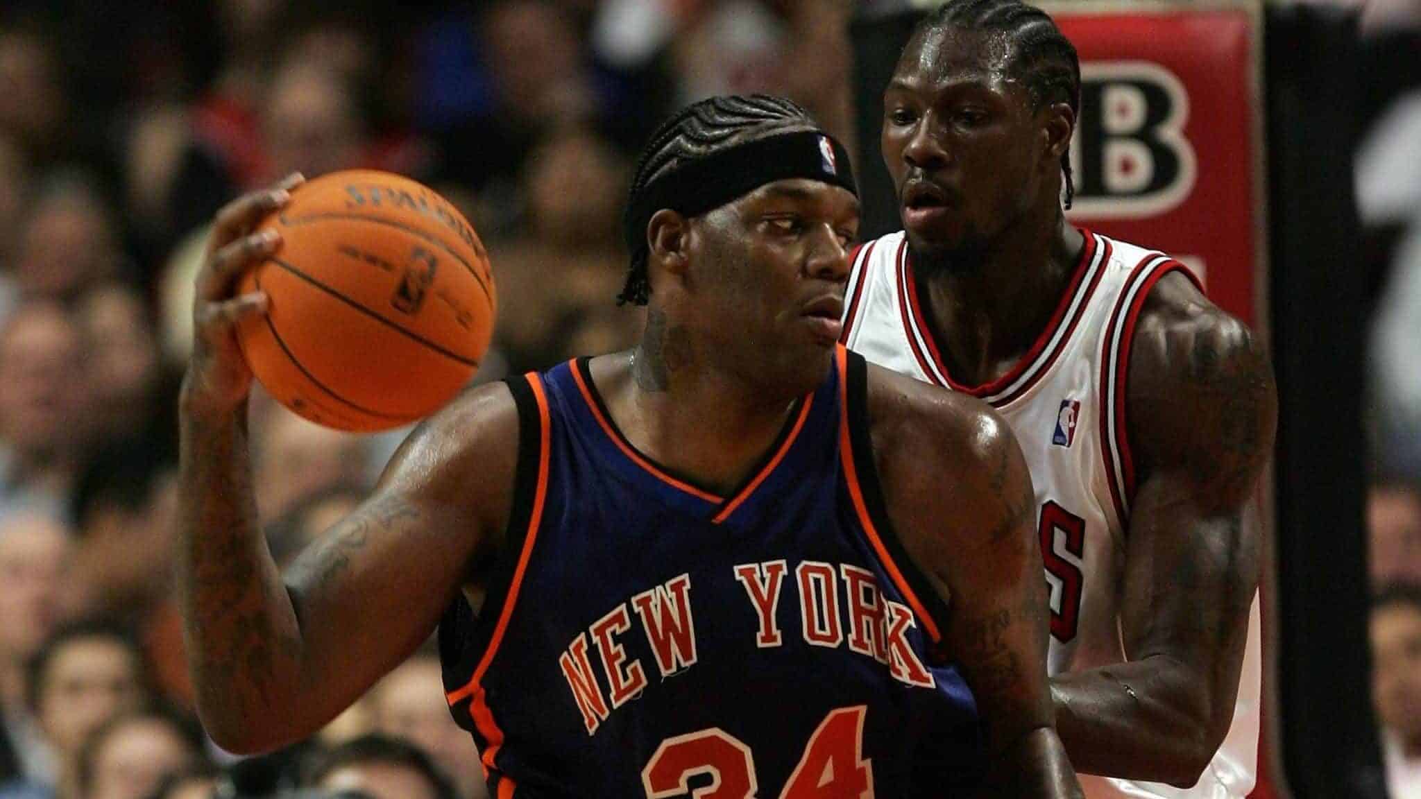 CHICAGO - NOVEMBER 28: Eddy Curry #34 of the New York Knicks looks to move the ball in the post against Ben Wallace #3 of the Chicago Bulls November 28, 2006 at the United Center in Chicago, Illinois. The Bulls won 102-85.