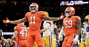 NEW ORLEANS, LOUISIANA - JANUARY 13: Isaiah Simmons #11 of the Clemson Tigers celebrates a defensive stop against the LSU Tigers during the first quarter in the College Football Playoff National Championship game at Mercedes Benz Superdome on January 13, 2020 in New Orleans, Louisiana.