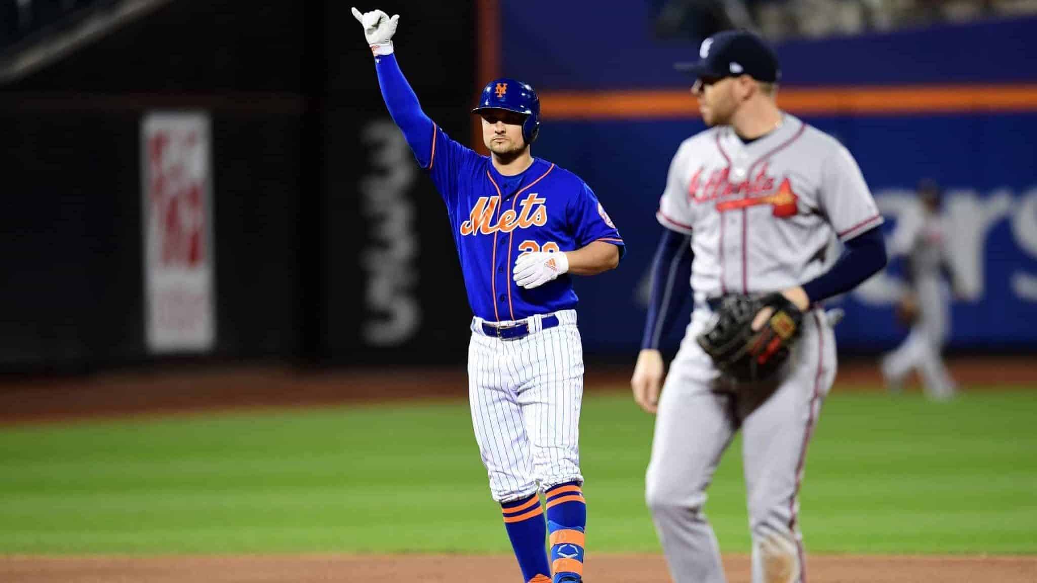 NEW YORK, NEW YORK - SEPTEMBER 27: J.D. Davis #28 of the New York Mets celebrates a double in the first inning of their game against the Atlanta Braves at Citi Field on September 27, 2019 in the Flushing neighborhood of the Queens borough of New York City.