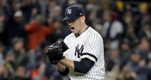 NEW YORK, NEW YORK - OCTOBER 18: James Paxton #65 of the New York Yankees reacts after retiring the Houston Astros during the sixth inning in game five of the American League Championship Series at Yankee Stadium on October 18, 2019 in New York City.