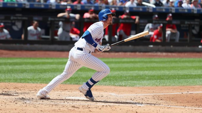 NEW YORK, NEW YORK - AUGUST 11: Jeff McNeil #6 of the New York Mets doubles and drives in two runs in the third inning against the Washington Nationals during their game at Citi Field on August 11, 2019 in New York City.