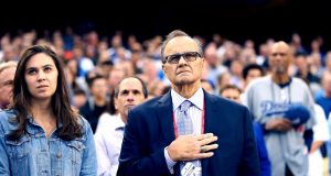 LOS ANGELES, CA - OCTOBER 31: MLB chief baseball officer Joe Torre stands for the national anthem before game six of the 2017 World Series between the Houston Astros and the Los Angeles Dodgers at Dodger Stadium on October 31, 2017 in Los Angeles, California.