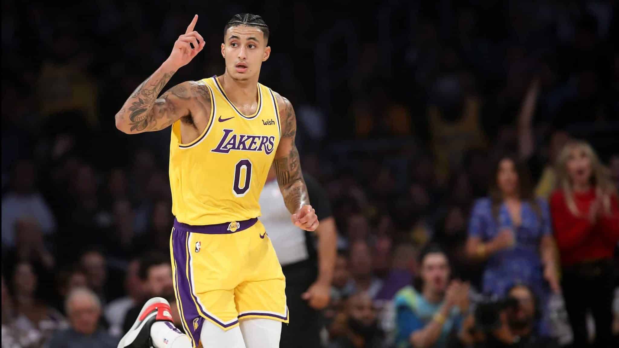 LOS ANGELES, CALIFORNIA - NOVEMBER 19: Kyle Kuzma #0 of the Los Angeles Lakers reacts after making a three point shot during the first half of a game against the Oklahoma City Thunder at Staples Center on November 19, 2019 in Los Angeles, California. NOTE TO USER: User expressly acknowledges and agrees that, by downloading and/or using this photograph, user is consenting to the terms and conditions of the Getty Images License Agreement