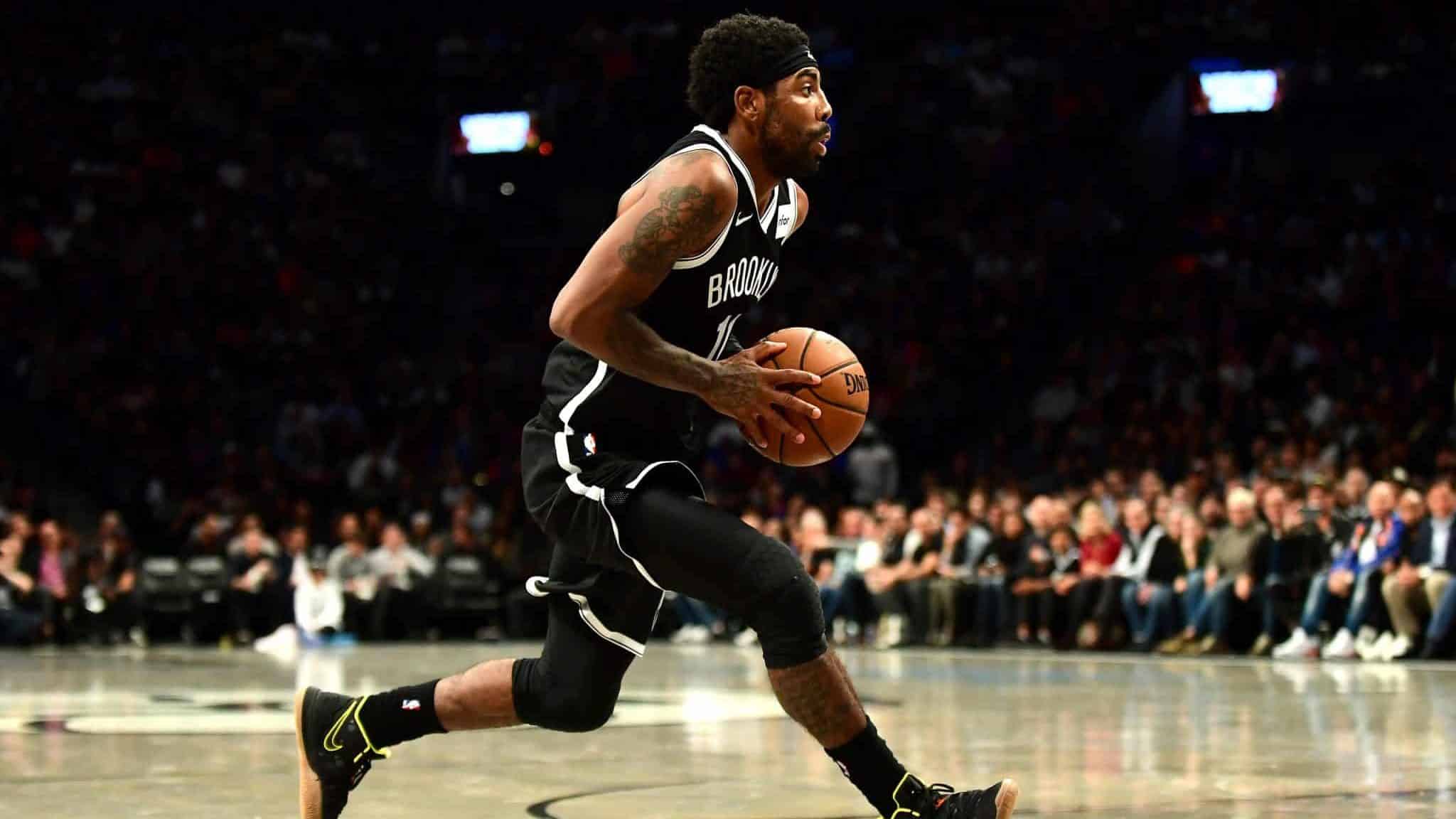 NEW YORK, NEW YORK - OCTOBER 25: Kyrie Irving #11 of the Brooklyn Nets conrols the ball during the first half of their game against the New York Knicks at Barclays Center on October 25, 2019 in the Brooklyn borough of New York City.