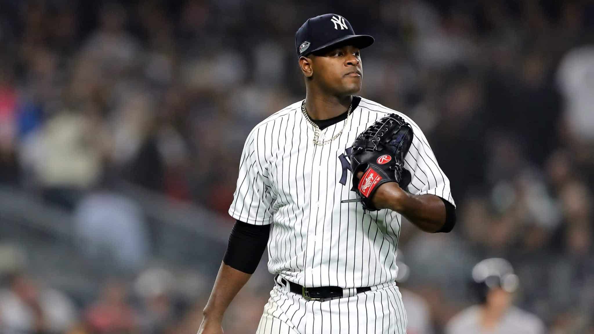 NEW YORK, NEW YORK - OCTOBER 08: Luis Severino #40 of the New York Yankees walks back to the dugout after being pulled against the Boston Red Sox during the fourth inning in Game Three of the American League Division Series at Yankee Stadium on October 08, 2018 in the Bronx borough of New York City.