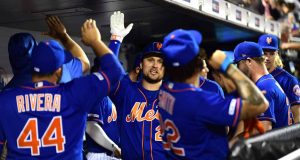 NEW YORK, NEW YORK - SEPTEMBER 27: J.D. Davis #28 of the New York Mets celebrates with teammates after his home run in the fourth inning of their game against the Atlanta Braves at Citi Field on September 27, 2019 in the Flushing neighborhood of the Queens borough of New York City.