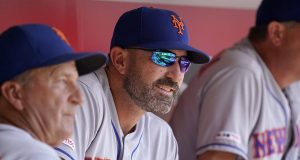 CINCINNATI, OHIO - SEPTEMBER 22: Mickey Callaway #36 manager of the New York Mets sits in the dugout during the game against the Cincinnati Reds at Great American Ball Park on September 22, 2019 in Cincinnati, Ohio.