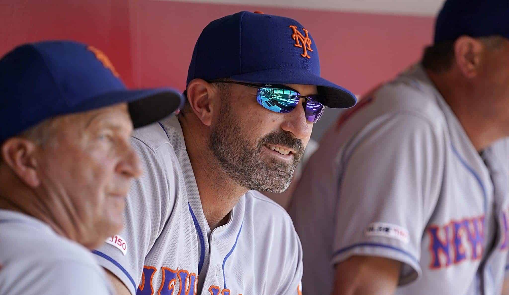 CINCINNATI, OHIO - SEPTEMBER 22: Mickey Callaway #36 manager of the New York Mets sits in the dugout during the game against the Cincinnati Reds at Great American Ball Park on September 22, 2019 in Cincinnati, Ohio.