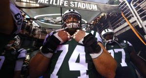 EAST RUTHERFORD, NJ - DECEMBER 05: Nick Mangold #74 of the New York Jets waits to be introduced against the Indianapolis Colts before their game at MetLife Stadium on December 5, 2016 in East Rutherford, New Jersey.