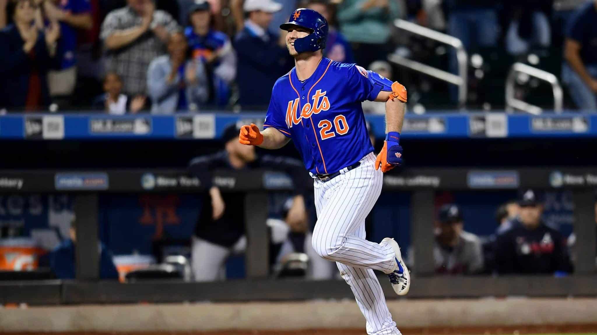 NEW YORK, NEW YORK - SEPTEMBER 27: Pete Alonso #20 of the New York Mets smiles as he runs the bases after hitting a home run in the first inning of their game against the Atlanta Braves, his 52nd home run of the season and tying Aaron Judge's rookie home run record, during their game at Citi Field on September 27, 2019 in the Flushing neighborhood of the Queens borough of New York City.