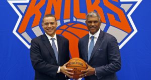 This July 17, 2017, file photo shows New York Knicks general manager Scott Perry (left) and president Steve Mills posing for a picture after a news conference in Greenburgh, New York. Mills and Perry are trying to change the identity of the New York Knicks.