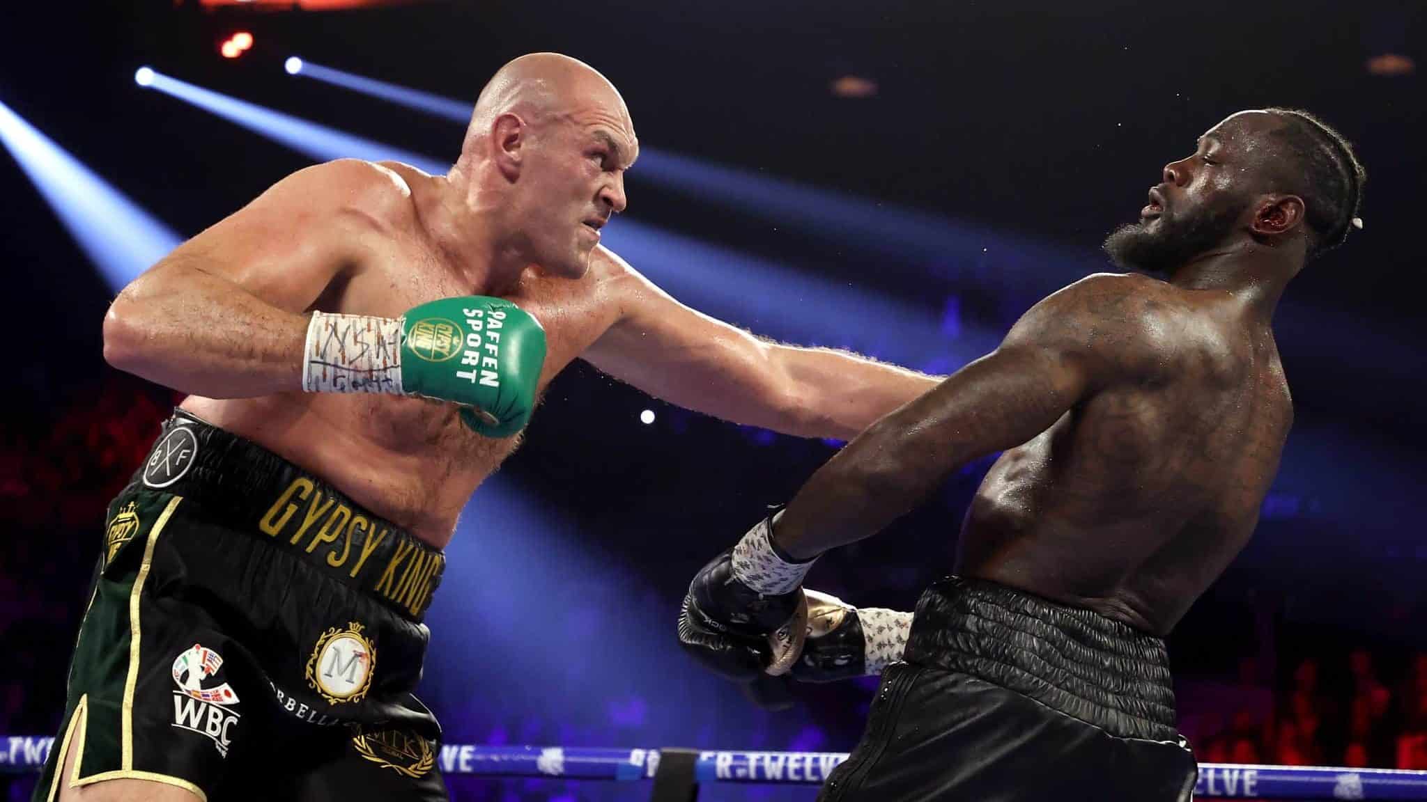 LAS VEGAS, NEVADA - FEBRUARY 22: Tyson Fury (L) punches Deontay Wilder during their Heavyweight bout for Wilder's WBC and Fury's lineal heavyweight title on February 22, 2020 at MGM Grand Garden Arena in Las Vegas, Nevada.