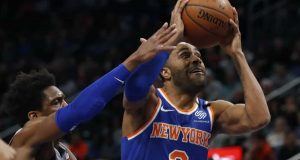 New York Knicks guard Wayne Ellington (2) attempts to shoot as Detroit Pistons guard Langston Galloway defends during the first half of an NBA basketball game, Saturday, Feb. 8, 2020, in Detroit.