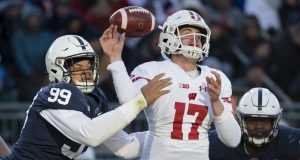 STATE COLLEGE, PA - NOVEMBER 10: Yetur Gross-Matos #99 of the Penn State Nittany Lions hits the arm of Jack Coan #17 of the Wisconsin Badgers as he throws during the second half at Beaver Stadium on November 10, 2018 in State College, Pennsylvania.
