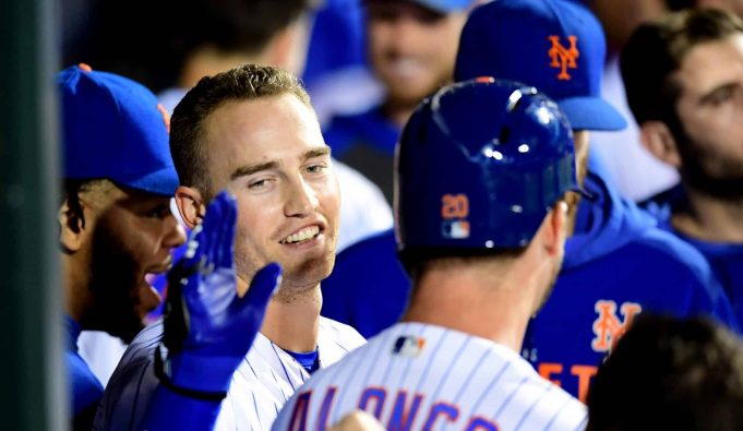 NEW YORK, NEW YORK - SEPTEMBER 25: Brandon Nimmo #9 and Pete Alonso #20 of the New York Mets celebrates with teammates after Alonso hit a home run in the second inning of their game against the Miami Marlins at Citi Field on September 25, 2019 in the Flushing neighborhood of the Queens borough in New York City.