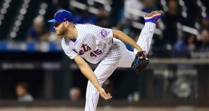 NEW YORK, NEW YORK - SEPTEMBER 26: Zack Wheeler #45 of the New York Mets follows through with a pitch in the first inning of their game against the Miami Marlins at Citi Field on September 26, 2019 in the Flushing neighborhood of the Queens borough in New York City.