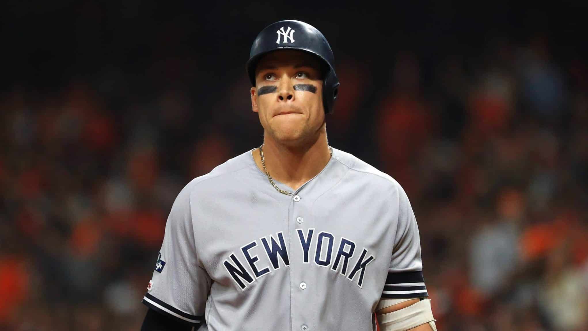 HOUSTON, TEXAS - OCTOBER 13: Aaron Judge #99 of the New York Yankees reacts after flying out during the sixth inning against the Houston Astros in game two of the American League Championship Series at Minute Maid Park on October 13, 2019 in Houston, Texas.