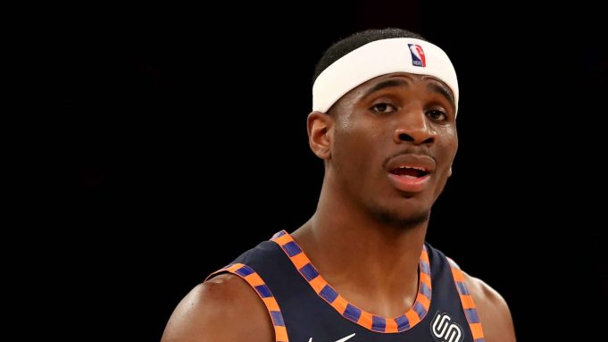 NEW YORK, NEW YORK - FEBRUARY 24: Damyean Dotson #21 of the New York Knicks reacts in the second half against the San Antonio Spurs at Madison Square Garden on February 24, 2019 in New York City.The New York Knicks defeated the San Antonio Spurs 130-118. NOTE TO USER: User expressly acknowledges and agrees that, by downloading and or using this photograph, User is consenting to the terms and conditions of the Getty Images License Agreement.
