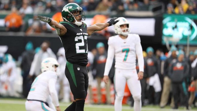 EAST RUTHERFORD, NEW JERSEY - DECEMBER 08: Darryl Roberts #27 of the New York Jets celebrates after Jason Sanders #7 of the Miami Dolphins misses a field goal in the third quarter during their game at MetLife Stadium on December 08, 2019 in East Rutherford, New Jersey.