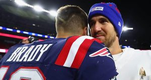 FOXBOROUGH, MASSACHUSETTS - OCTOBER 10: Tom Brady #12 of the New England Patriots shakes hands with Eli Manning #10 of the New York Giants after their game at Gillette Stadium on October 10, 2019 in Foxborough, Massachusetts. The New England Patriots defeated the New York Giants with a score of 35 to 14.