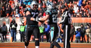 CLEVELAND, OH - DECEMBER 09: Christian McCaffrey #22 of the Carolina Panthers celebrates his touchdown with Greg Van Roten #73 during the first quarter against the Cleveland Browns at FirstEnergy Stadium on December 9, 2018 in Cleveland, Ohio. New York Jets