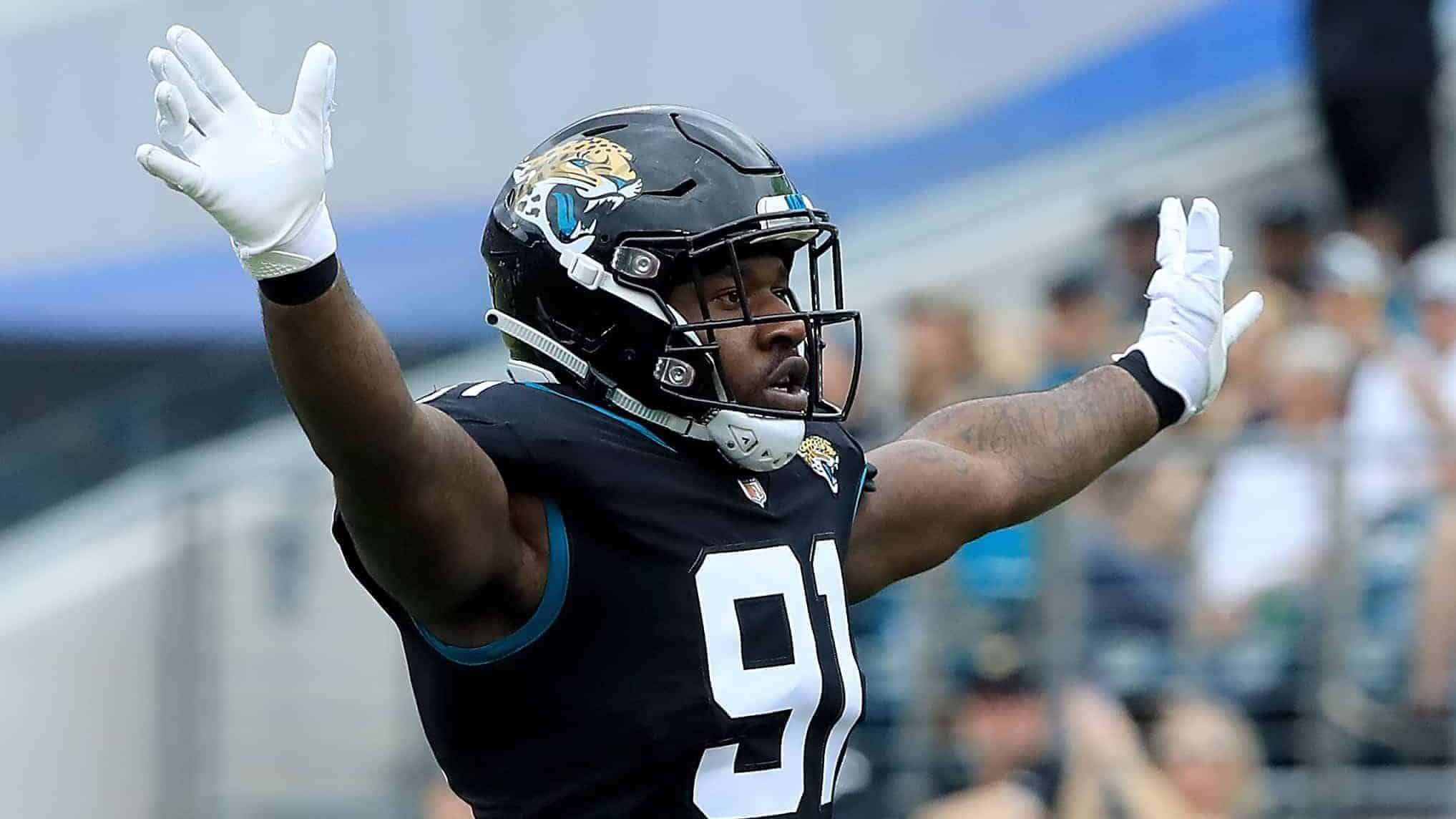 JACKSONVILLE, FLORIDA - DECEMBER 02: Yannick Ngakoue #91 of the Jacksonville Jaguars celebrates a defensive stop during the game against the Indianapolis Colts on December 02, 2018 in Jacksonville, Florida.