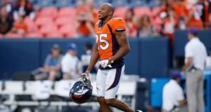 DENVER, CO - AUGUST 29: Cornerback Chris Harris #25 of the Denver Broncos runs on the field before a preseason game against the Arizona Cardinals at Broncos Stadium at Mile High on August 29, 2019 in Denver, Colorado.