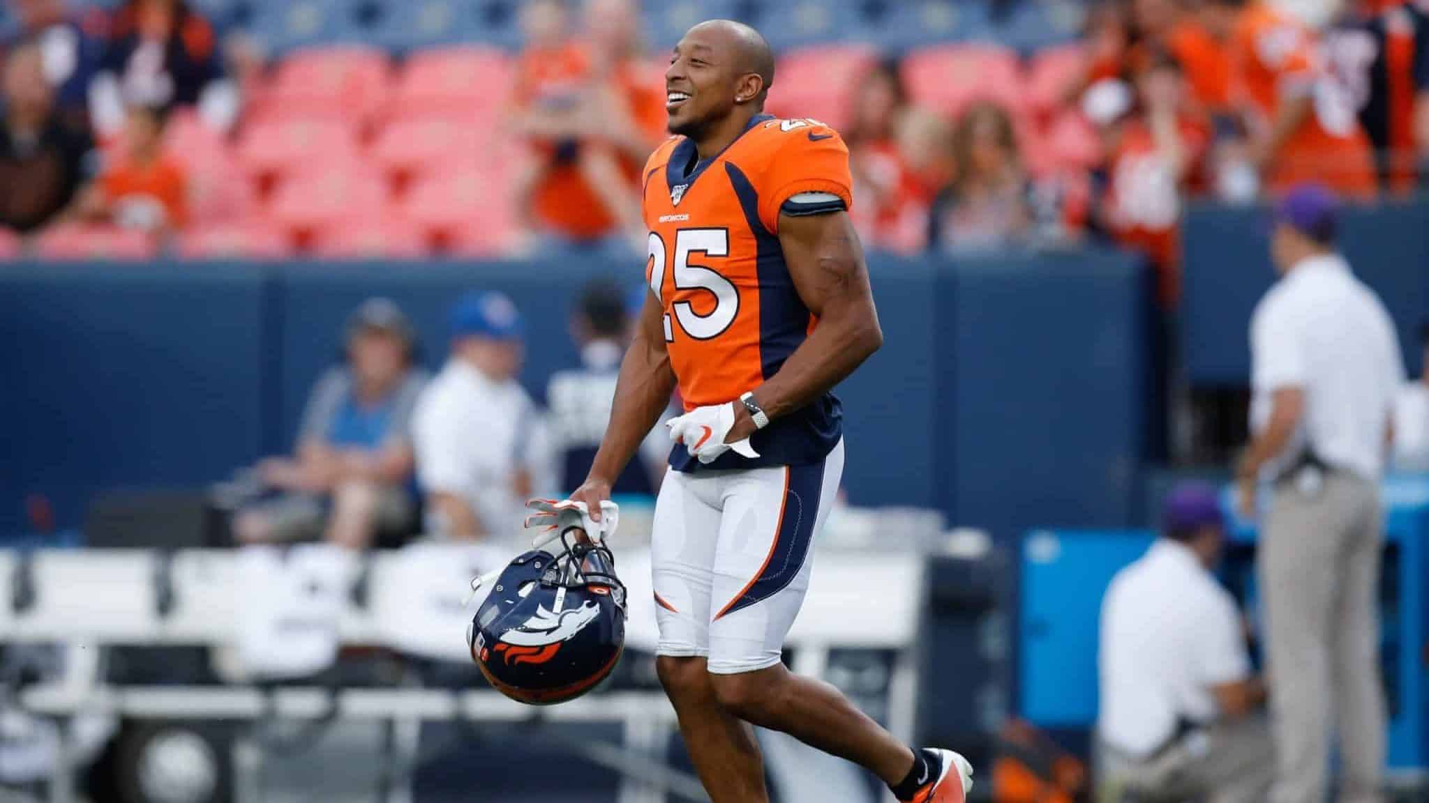 DENVER, CO - AUGUST 29: Cornerback Chris Harris #25 of the Denver Broncos runs on the field before a preseason game against the Arizona Cardinals at Broncos Stadium at Mile High on August 29, 2019 in Denver, Colorado.