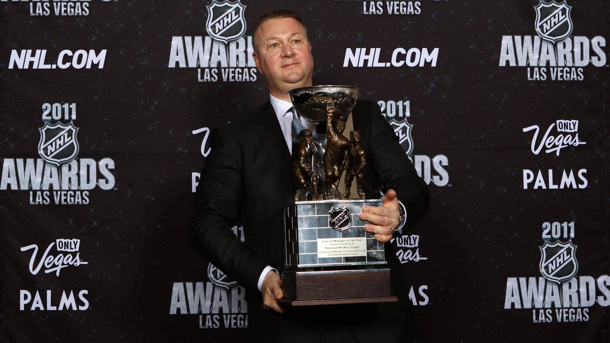 LAS VEGAS, NV - JUNE 22: General Manager Mike Gillis of the Vancouver Canucks poses after winning the NHL General Manager of the Year Award during the 2011 NHL Awards at The Pearl concert theater at the Palms Casino Resort June 22, 2011 in Las Vegas, Nevada.