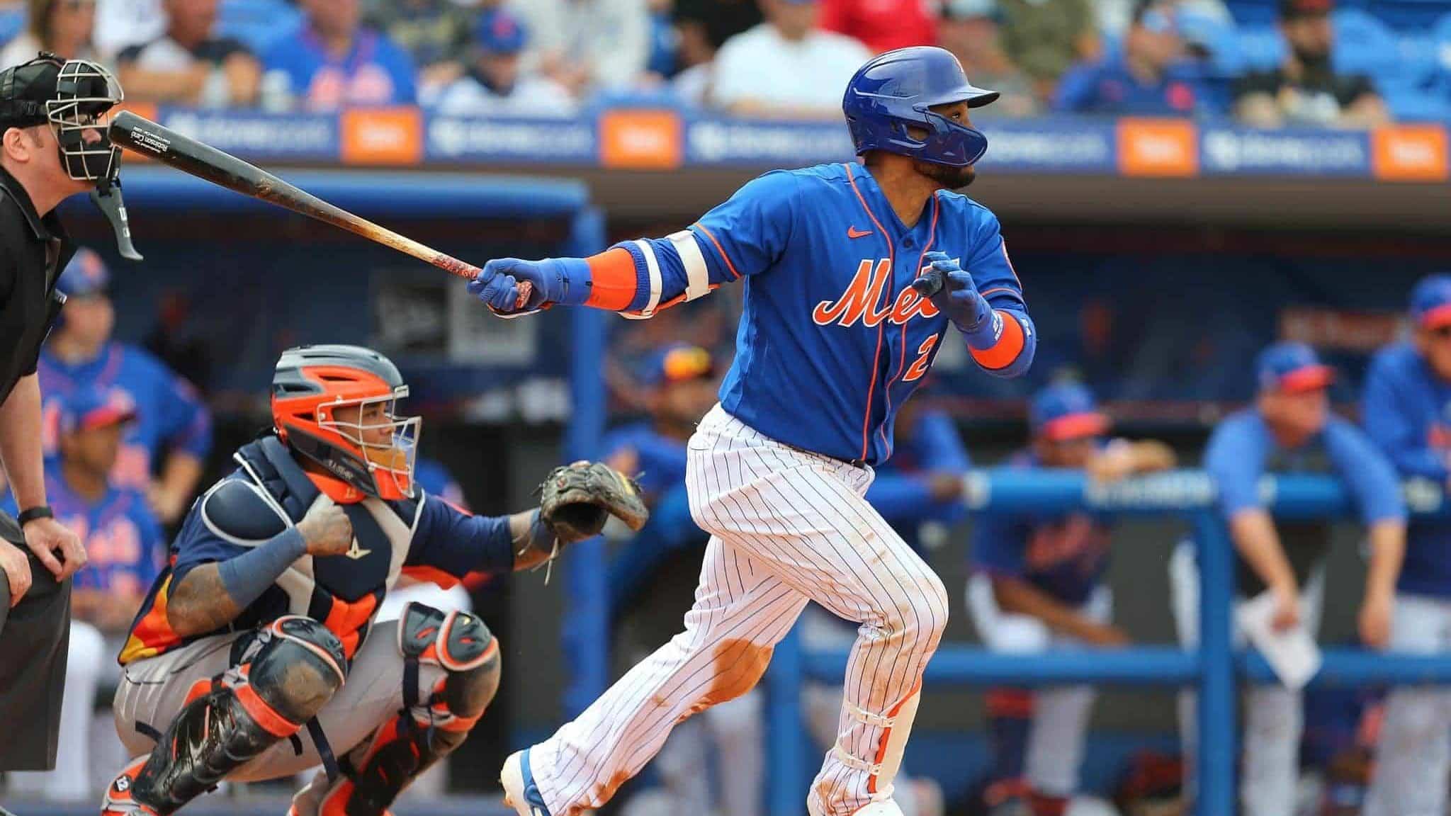 PORT ST. LUCIE, FL - MARCH 08: Robinson Cano #24 of the New York Mets hits an RBI double against the Houston Astros during the fifth inning of a spring training baseball game at Clover Park on March 8, 2020 in Port St. Lucie, Florida. The Mets defeated the Astros 3-1.