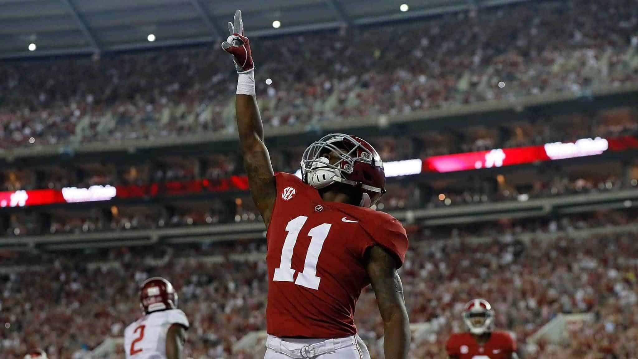TUSCALOOSA, AL - OCTOBER 14: Henry Ruggs III #11 of the Alabama Crimson Tide reacts after pulling in a touchdown reception against the Arkansas Razorbacks at Bryant-Denny Stadium on October 14, 2017 in Tuscaloosa, Alabama. Potential New York Jets draft pick