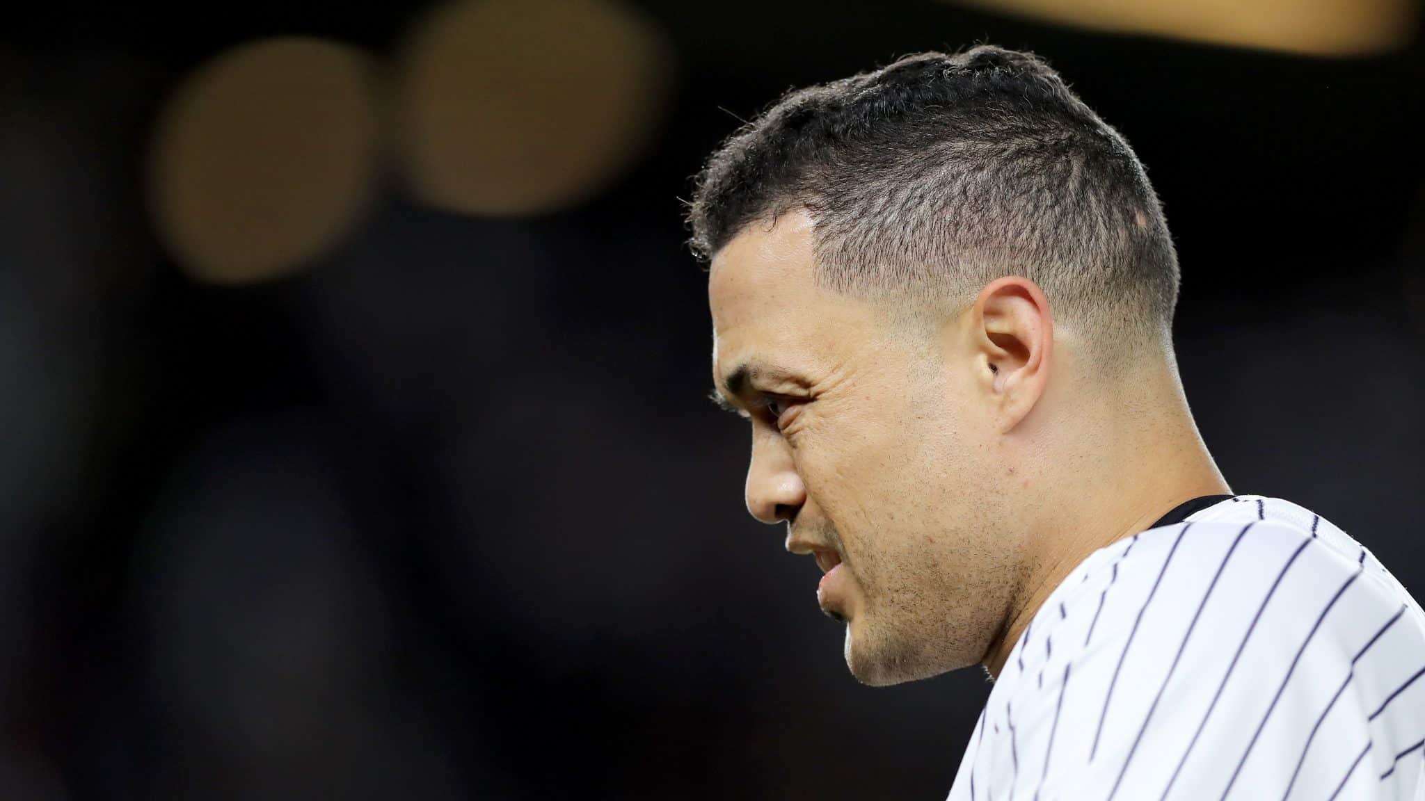 NEW YORK, NEW YORK - OCTOBER 04: Giancarlo Stanton #27 of the New York Yankees reacts after grounding out against the Minnesota Twins during the first inning in game one of the American League Division Series at Yankee Stadium on October 04, 2019 in New York City.