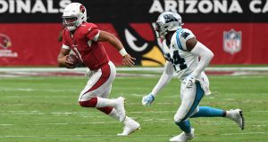 GLENDALE, ARIZONA - SEPTEMBER 22: Kyler Murray #1 of the Arizona Cardinals runs out of the pocket while being chased by James Bradberry #24 of the Carolina Panthers during the first half at State Farm Stadium on September 22, 2019 in Glendale, Arizona.
