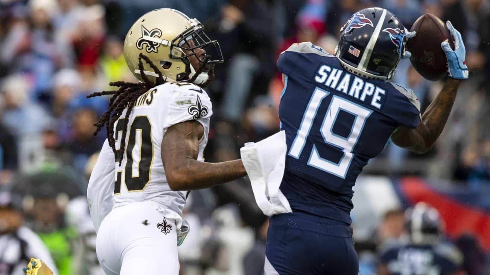 NASHVILLE, TN - DECEMBER 22: Tajae Sharpe #19 of the Tennessee Titans makes a touchdown reception against Janoris Jenkins #20 of the New Orleans Saints during the fourth quarter at Nissan Stadium on December 22, 2019 in Nashville, Tennessee. New Orleans defeats Tennessee 38-28.
