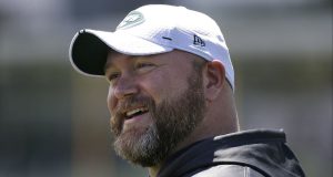 New York Jets general manager Joe Douglas smiles during a practice at the team's training facility in Florham Park, N.J., Tuesday, June 11, 2019.