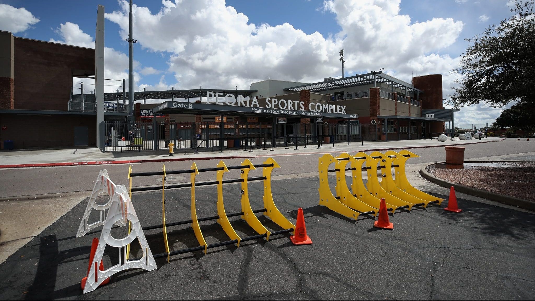 PEORIA, ARIZONA - MARCH 13: Parking barriers and cones are set up outside of Peoria Stadium on March 13, 2020 in Peoria, Arizona. Major League Baseball cancelled spring training games and has delayed opening day by at least two weeks due to COVID-19.
