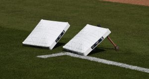 SAN DIEGO, CA - MARCH 28: Bases with the Opening Day logo sit on the field before the game between the San Diego Padres and the San Francisco Giants on Opening Day at Petco Park March 28, 2019 in San Diego, California.