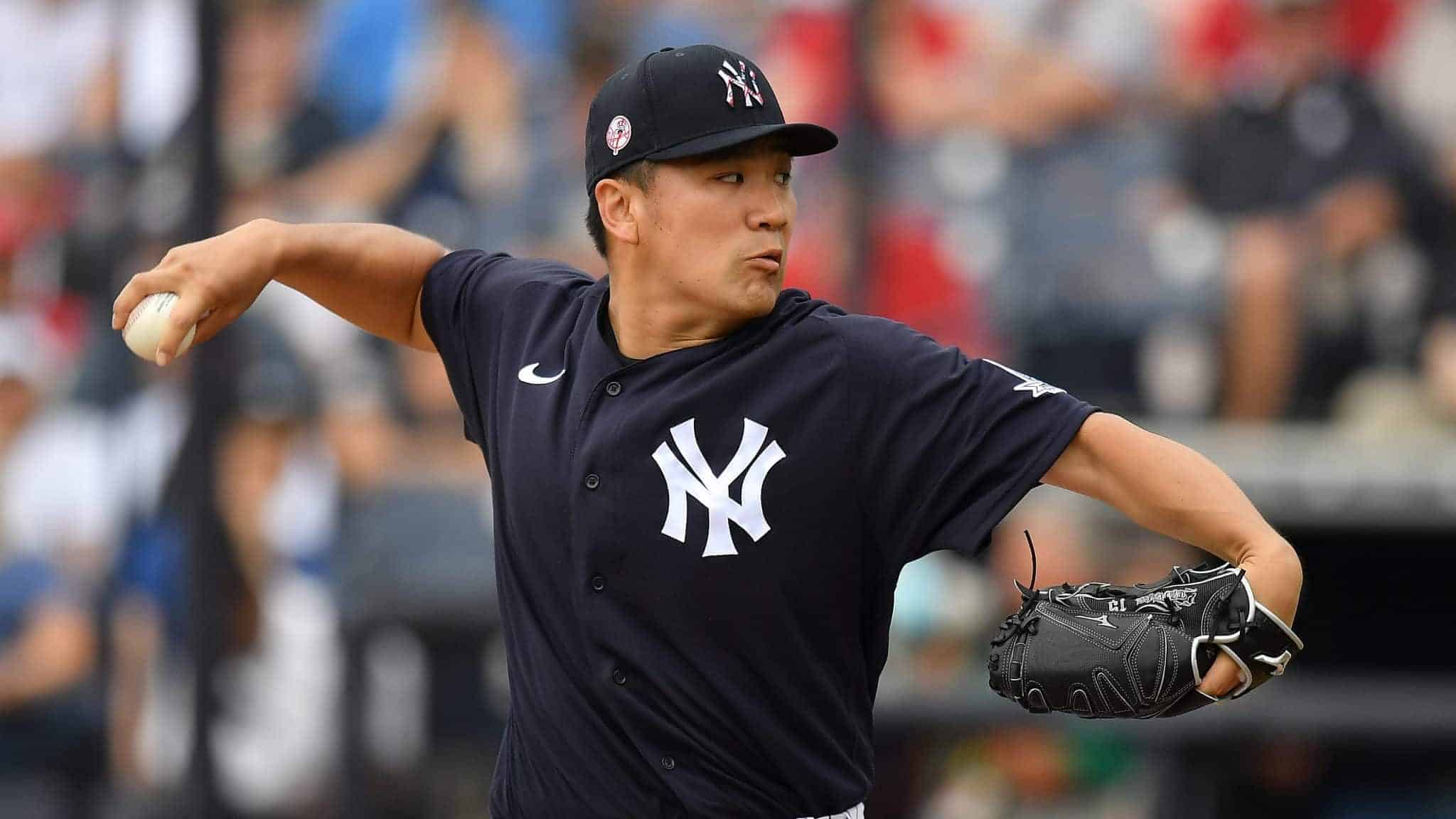 TAMPA, FLORIDA - FEBRUARY 26: Masahiro Tanaka #19 of the New York Yankees delivers a pitch in the second inning during the spring training game against the Washington Nationals at Steinbrenner Field on February 26, 2020 in Tampa, Florida.