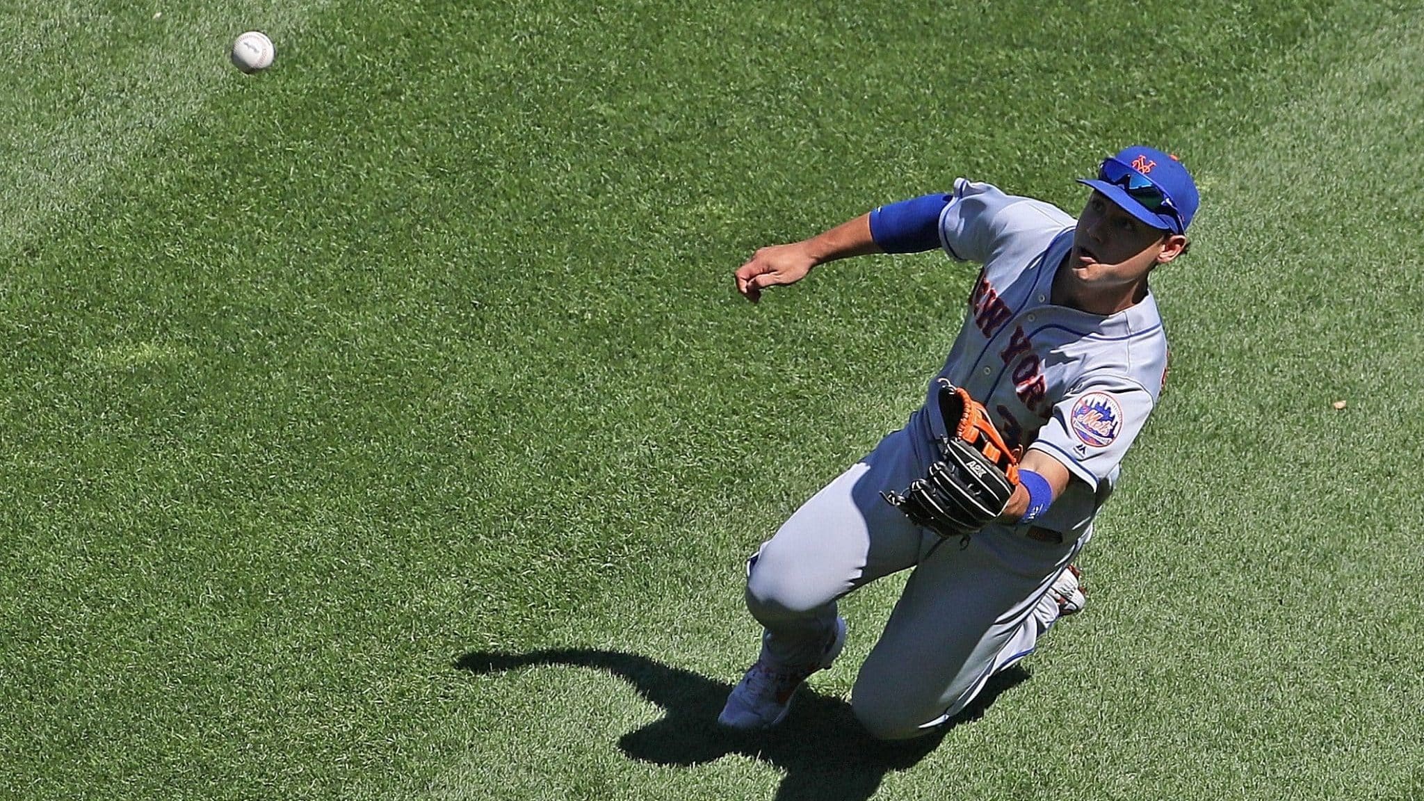 CHICAGO, ILLINOIS - AUGUST 01: Michael Conforto #30 of the New York Mets makes a sliding catch to end the 7th inning against the Chicago White Sox at Guaranteed Rate Field on August 01, 2019 in Chicago, Illinois.