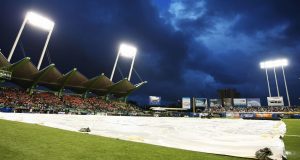 SAN JUAN, PUERTO RICO - JUNE 30: A tarp covers the field during a rain delay in the game between the New York Mets and the Florida Marlins at Hiram Bithorn Stadium on June 30, 2010 in San Juan, Puerto Rico.