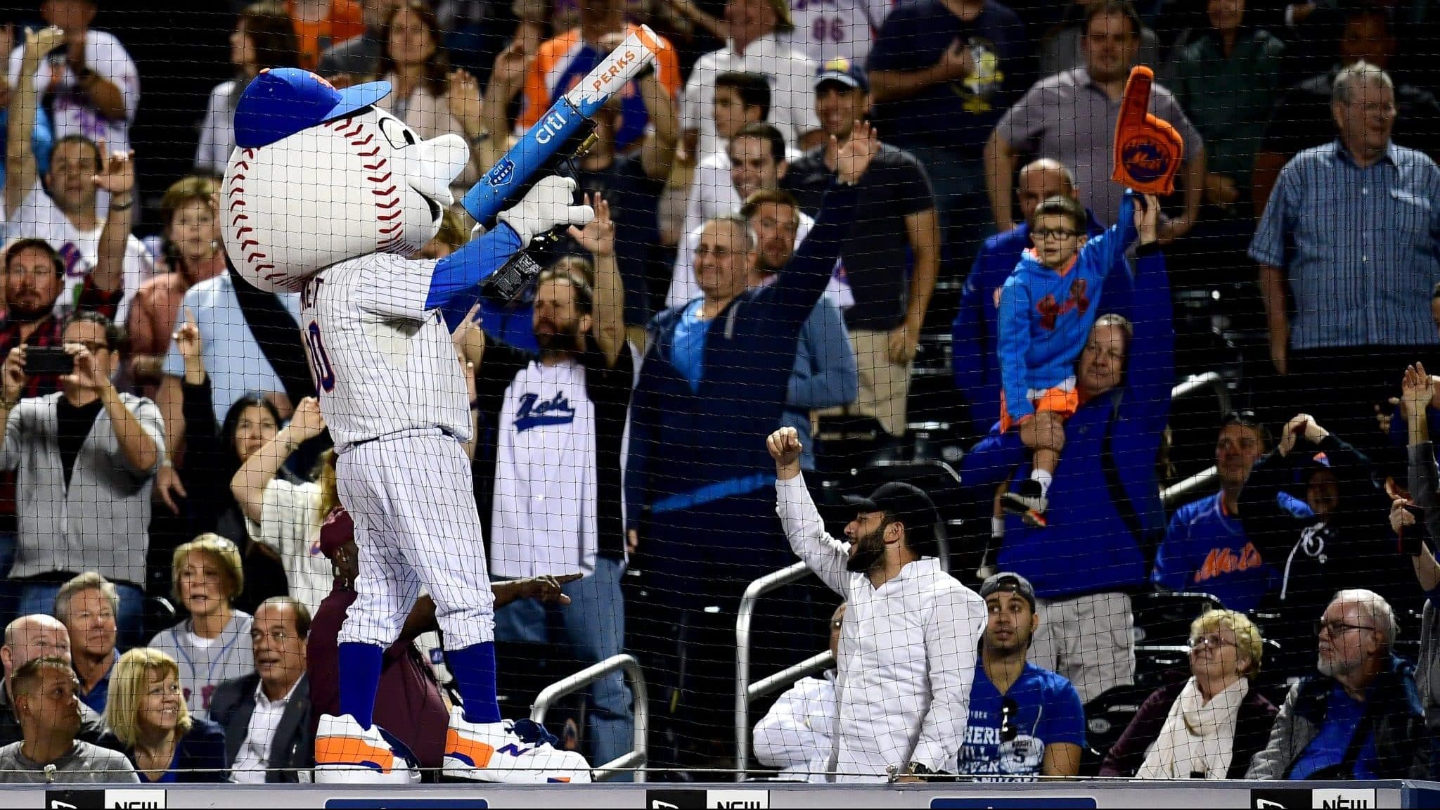 NEW YORK, NEW YORK - SEPTEMBER 24: Fans cheer as Mr. Met throws tee shirts during the New York Mets and Miami Marlins game at Citi Field on September 24, 2019 in the Flushing neighborhood of the Queens borough of New York City.