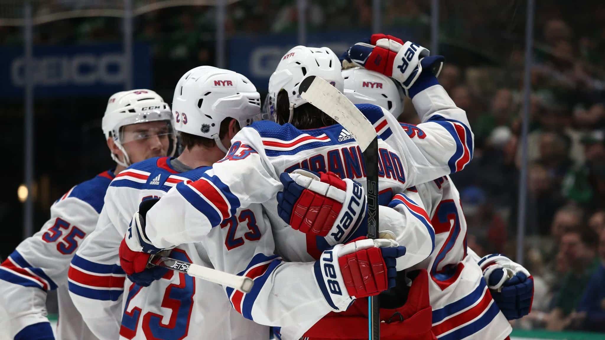 DALLAS, TEXAS - MARCH 10: The New York Rangers celebrate a goal by Kaapo Kakko #24 against the Dallas Stars during the second period at American Airlines Center on March 10, 2020 in Dallas, Texas.