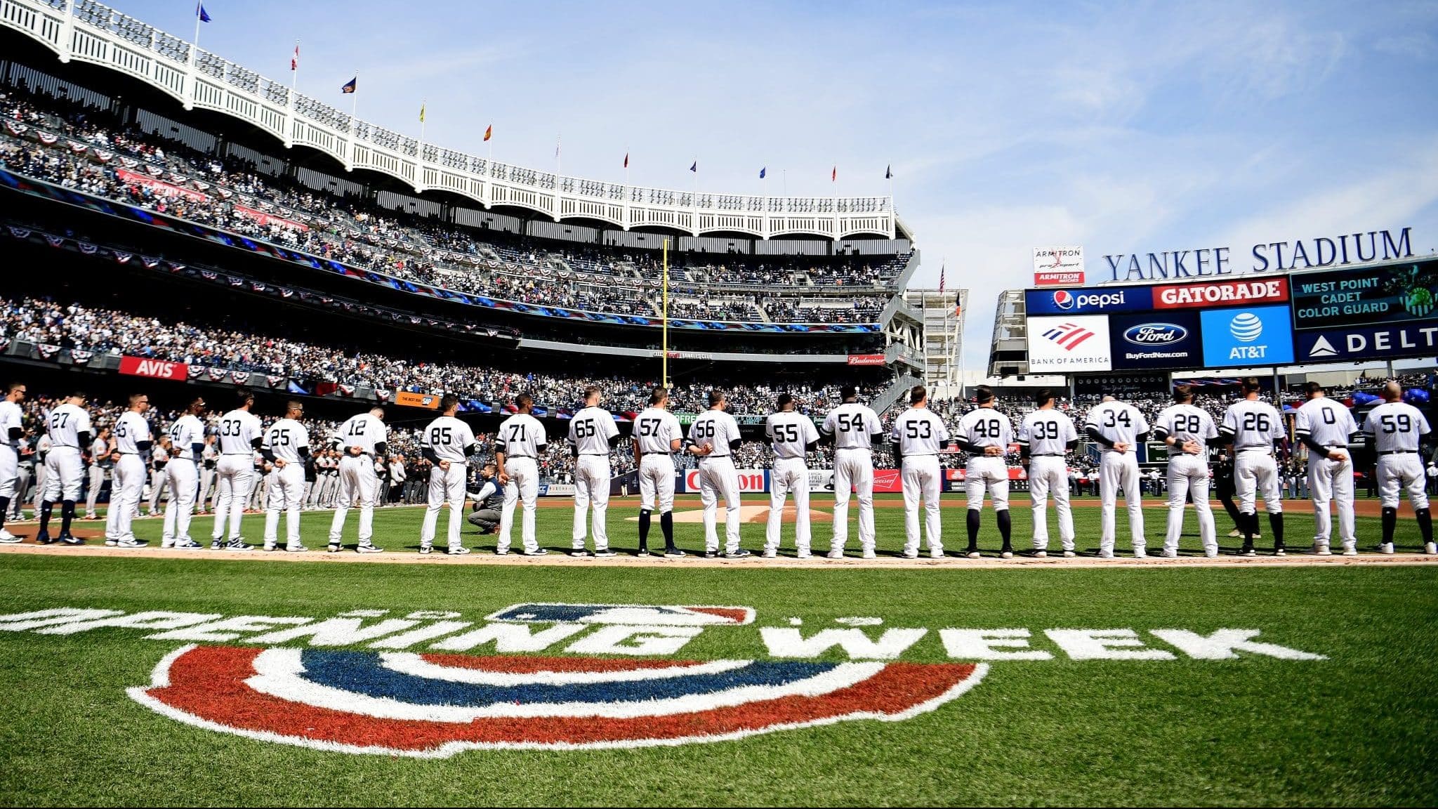 NEW YORK, NEW YORK - MARCH 28: The New York Yankees stand for the National Anthem before the game against the Baltimore Orioles on Opening Day at Yankee Stadium on March 28, 2019 in the Bronx borough of New York City.
