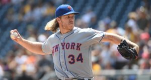 PITTSBURGH, PA - AUGUST 04: Noah Syndergaard #34 of the New York Mets delivers a pitch in the first inning during the game against the Pittsburgh Pirates at PNC Park on August 4, 2019 in Pittsburgh, Pennsylvania.
