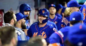 NEW YORK, NEW YORK - SEPTEMBER 27: Pete Alonso #20 of the New York Mets celebrates after hitting a home run in the first inning of their game against the Atlanta Braves, his 52nd home run of the season and tying Aaron Judge's rookie home run record, during their game at Citi Field on September 27, 2019 in the Flushing neighborhood of the Queens borough of New York City.