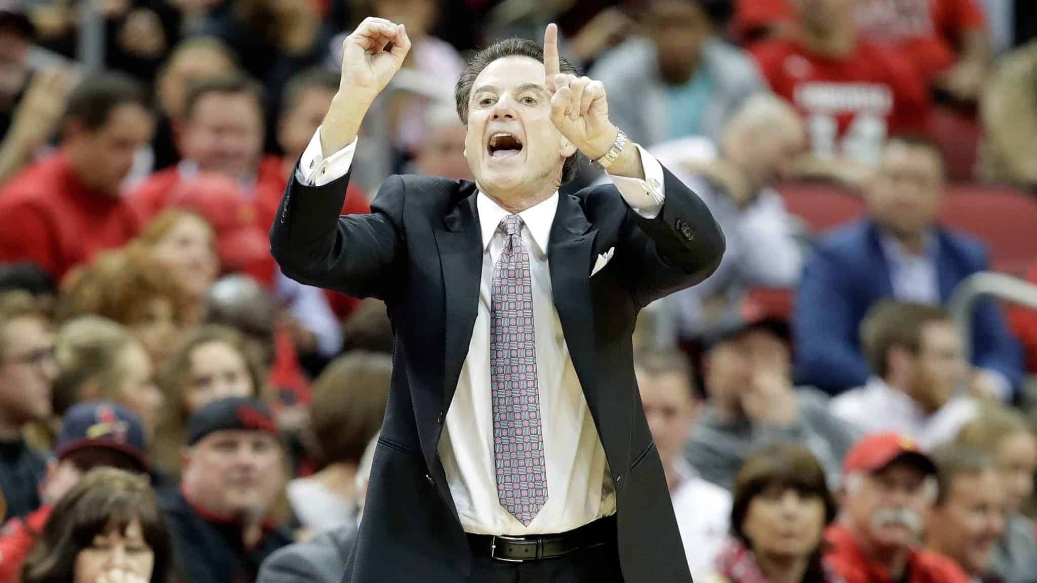 LOUISVILLE, KY - JANUARY 11: Rick Pitino the head coach of the Louisville Cardinals gives instructions to his team during the game against the Pittsburgh Panthers at KFC YUM! Center on January 11, 2017 in Louisville, Kentucky.