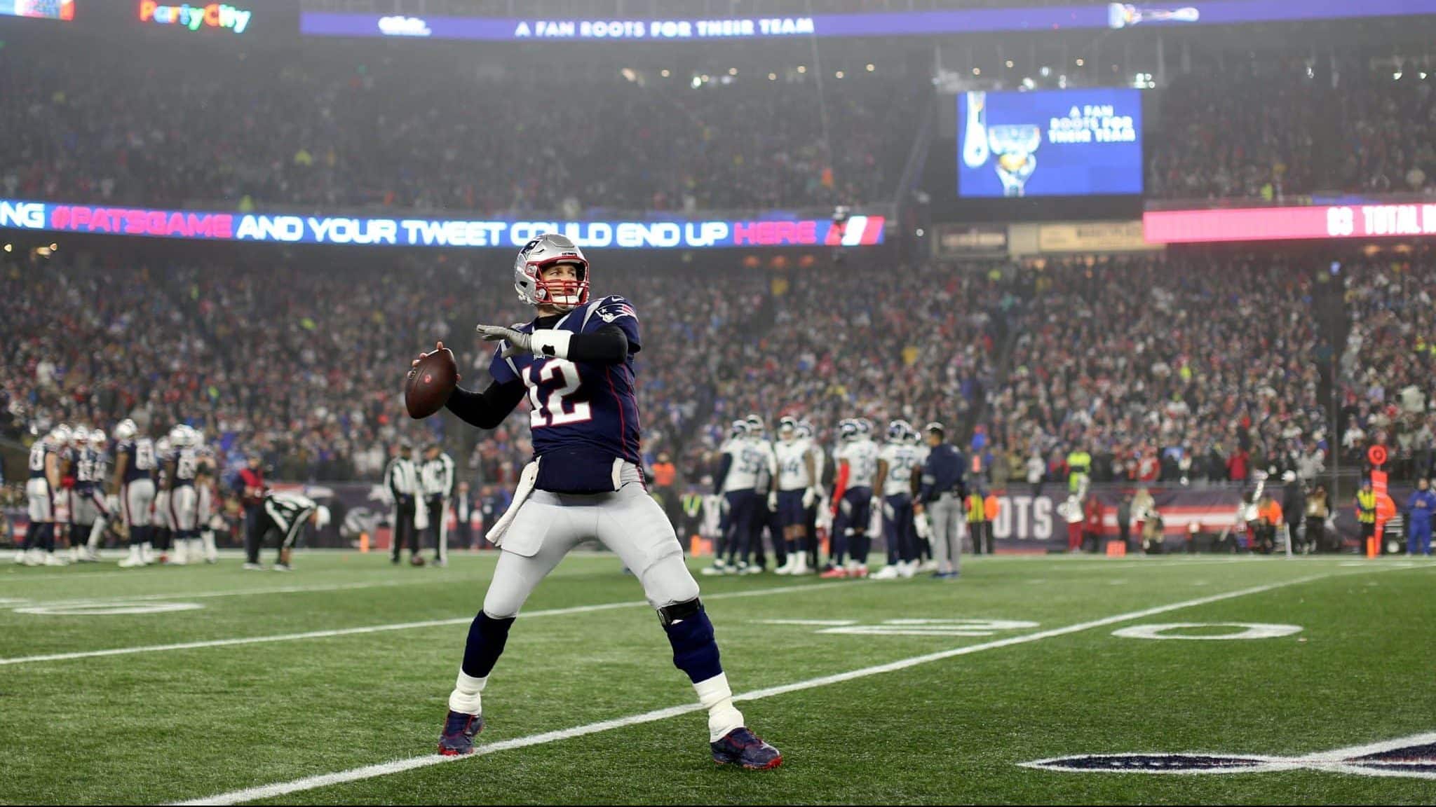 FOXBOROUGH, MASSACHUSETTS - JANUARY 04: Tom Brady #12 of the New England Patriots warms up during the AFC Wild Card Playoff game against the Tennessee Titans at Gillette Stadium on January 04, 2020 in Foxborough, Massachusetts.